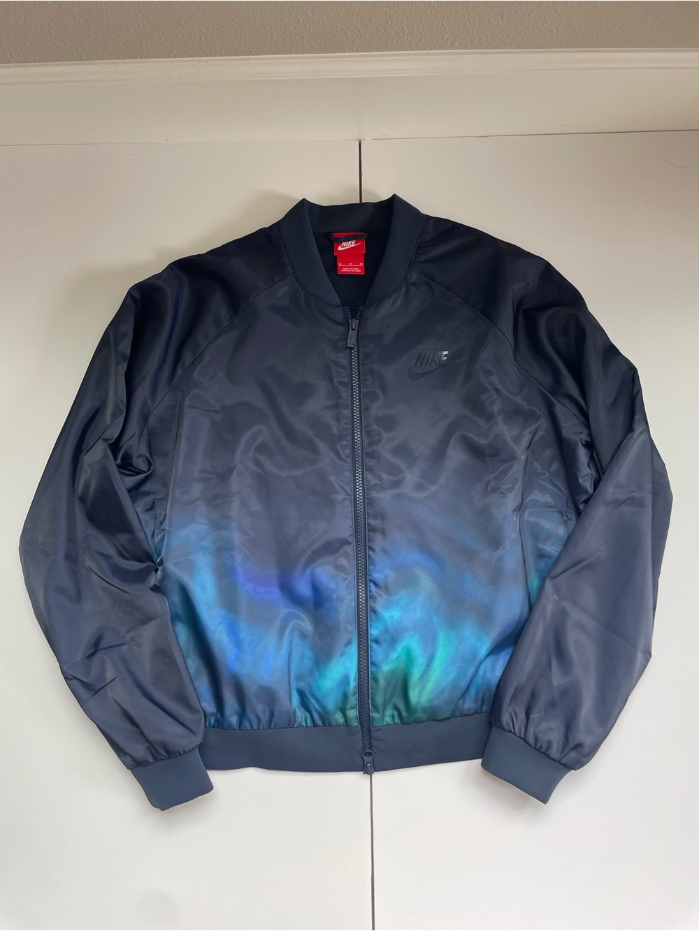 Nike Women’s Navy Bomber Jacket with Blue and Green Iridescent Hem